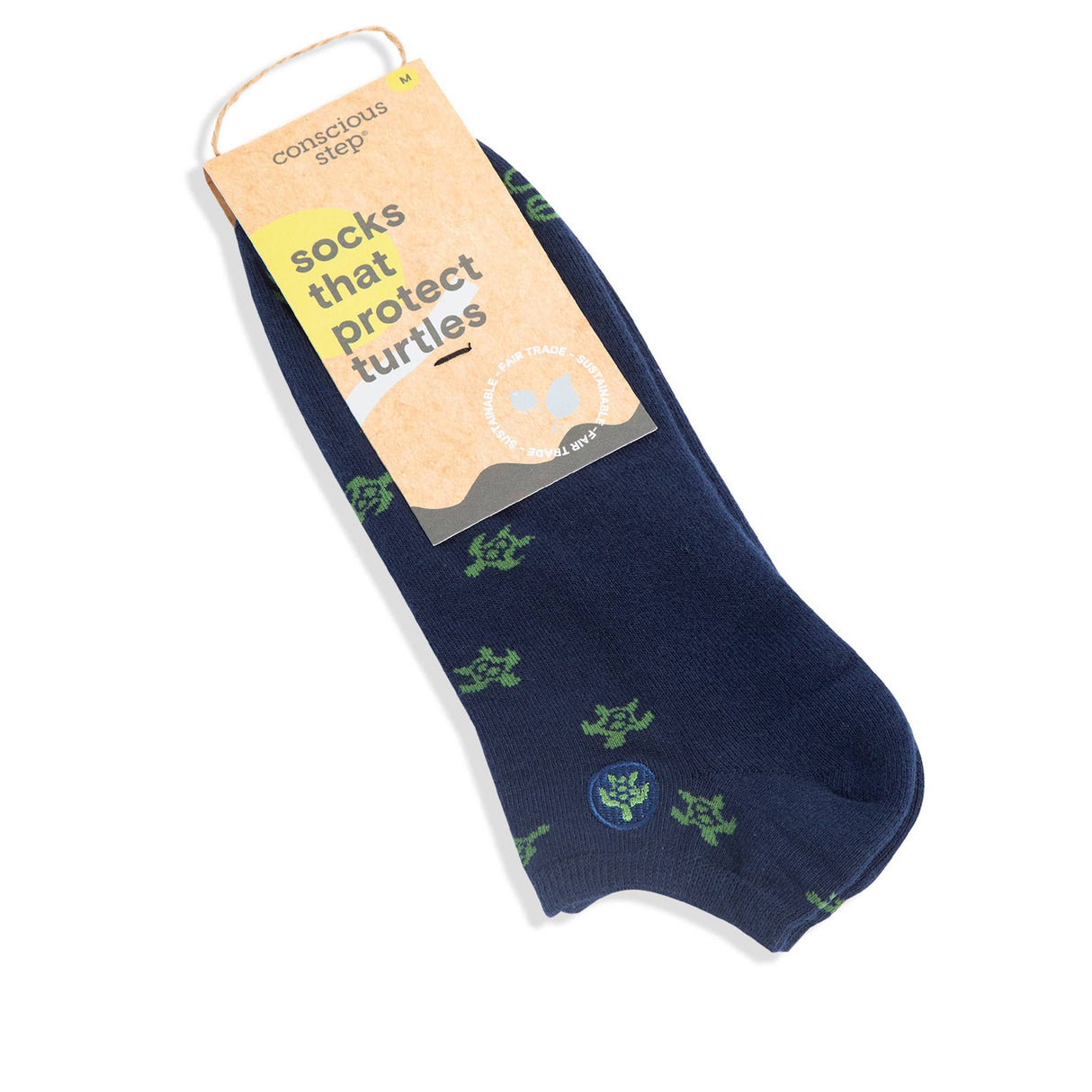 Navy blue sock with green turtle designs that support marine life and healthy oceans