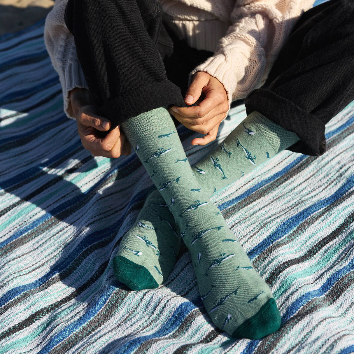 Protect our oceans with every step. Buy organic blend socks that help strength oceans and marine life. Shop the collection today!