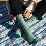 Protect our oceans with every step. Buy organic blend socks that help strength oceans and marine life. Shop the collection today!
