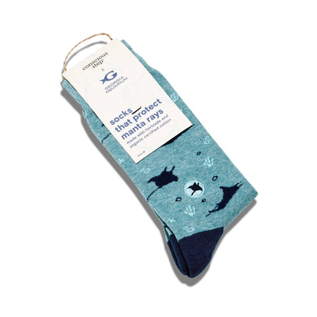 Flat lay of Manta Ray organic cotton protection socks showing the detailed marine life knit design.