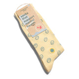 Smiley Faces organic cotton socks that support mental health in their premium eco-friendly retail package.